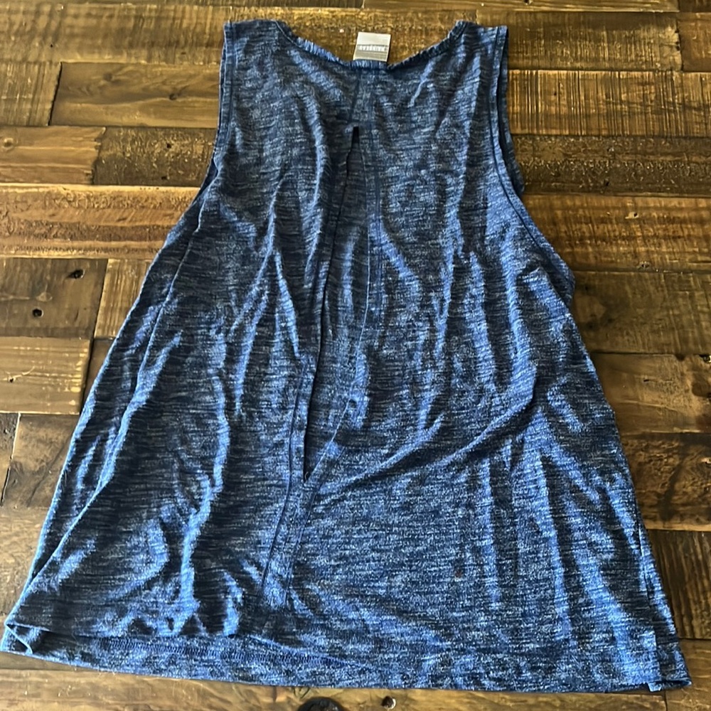 Gym shirt, worn couple times with a slit in the back